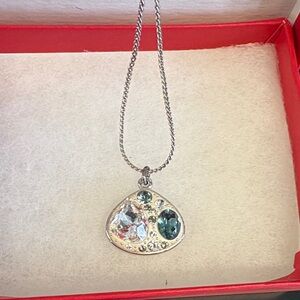 Elegant Silver Pendant Necklace with Blue and Clear Accents